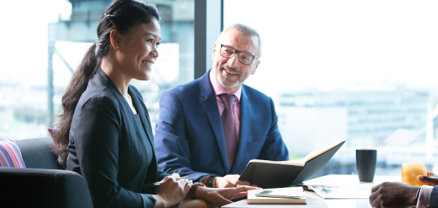 Two people in a business meeting